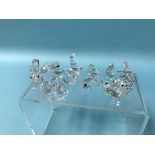 Twelve boxed miniature Swarovski glass animals