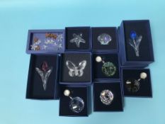 A collection of Swarovski crystal ornaments