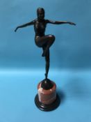 A reproduction bronze figure of an Art Deco style ballerina