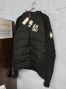 A Moncler jacket, with tag, size L