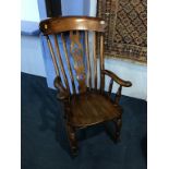 An elm lathe back rocking chair