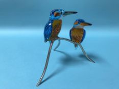A boxed Swarovski group of two coloured kingfisher supported on a branch