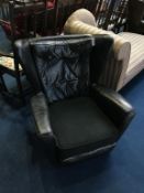 A 1950's vintage Howard Keith armchair