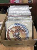 A quantity of LPs and 12" singles, to include Lynyrd Skynyrd