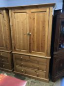 A pine wardrobe and chest