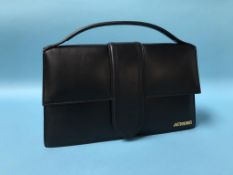 A Jacquemus handbag, with tag