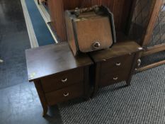 A coal scuttle and bedside drawers
