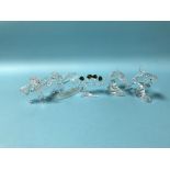Five boxed Swarovski glass animals to include dolphins, horses, birds etc.