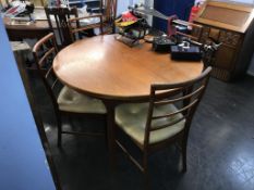 A teak McIntosh table and four chairs