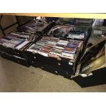 A large quantity of CDs and DVDs etc.