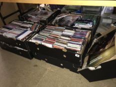A large quantity of CDs and DVDs etc.