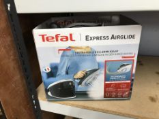 A boxed Tefal air glide