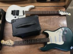 A Fender Squire and a Fernandes guitar and amp