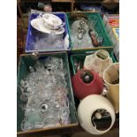 Four trays of glass, china and lamps etc.