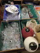 Four trays of glass, china and lamps etc.