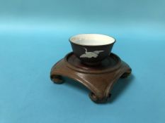 A small Japanese tea bowl, decorated with storks, signature to base, 6.5cm diameter
