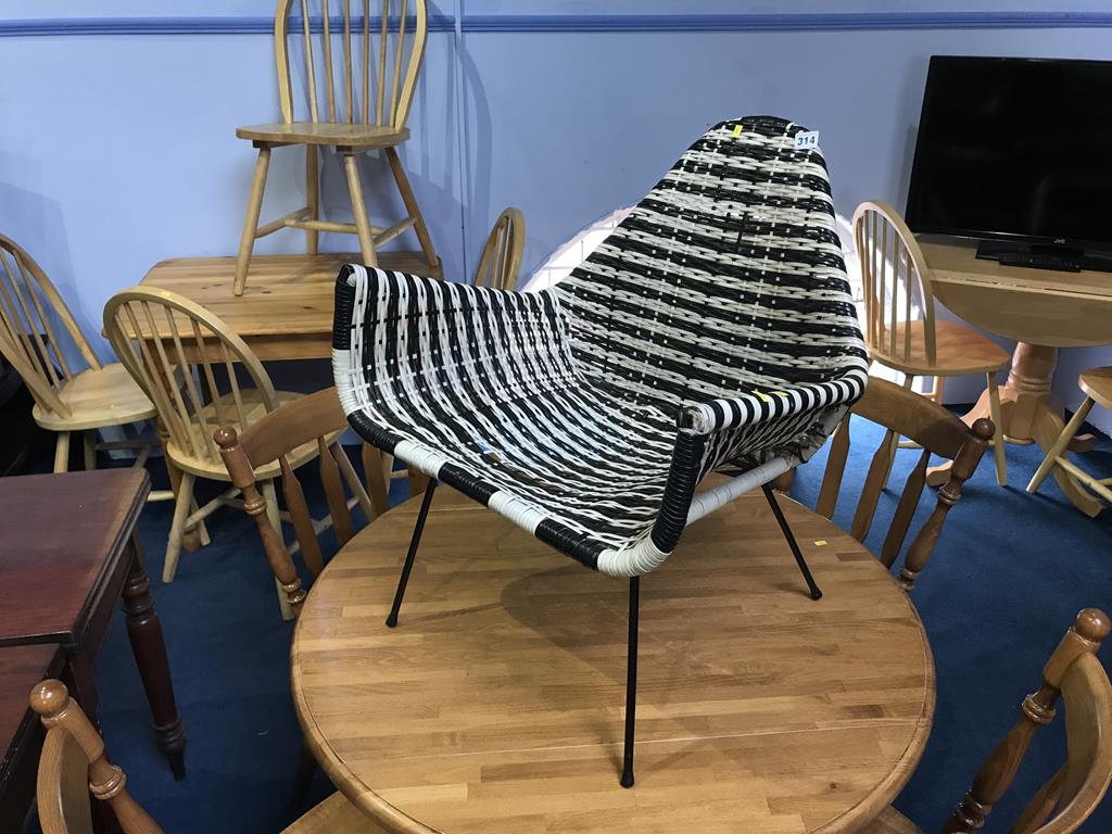 A 1960's black and white woven chair