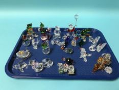 A collection of Swarovski figures