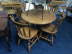 A kitchen table and four chairs
