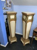 A pair of decorative Louis XV style marble inset and gilt metal mounted pedestals, 125cm height
