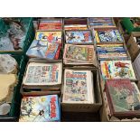 A large collection of comics and annuals