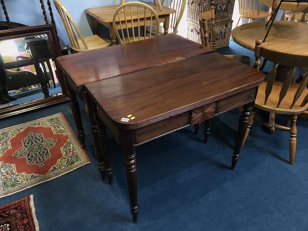 Two mahogany fold over tea tables