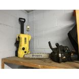 A chainsaw and a Karcher