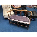 An Edwardian two seater settee