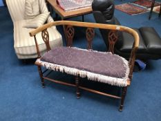 An Edwardian two seater settee