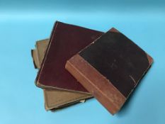 Two postcard albums and a photo album