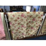 A Durham quilt with roses, with pink and mustard yellow striped reverse, 235 x 198cm