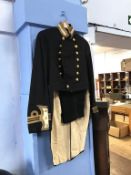 A Naval uniform, circa 1900, comprising officers frock coat and pair of trousers