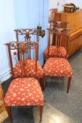 A set of four Edwardian inlaid chairs
