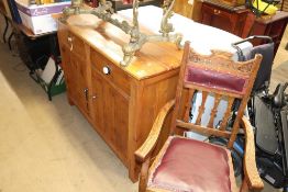 A pine dresser, carver chair, oval coffee table and pedestal etc.