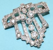 An Art Deco white metal brooch, mounted with approx. 5ct of diamonds, 8.7g, 32.5mm x 34mm approx.