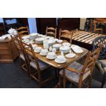 An Ercol refectory table and six chairs