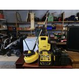 A Karcher and various power tools