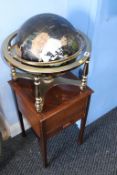 An oak sewing box and specimen globe