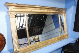 A gilt overmantel mirror, 153cm wide, 79cm high