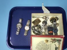 A box of assorted, to include a Swatch, a Zippo etc.