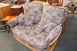 An Ercol two seater settee