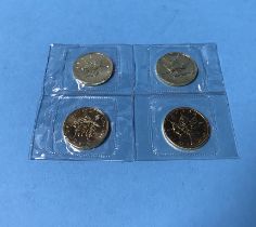 Four Canadian fine gold 1/4 oz coins