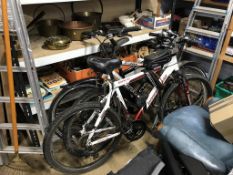 A Barracuda Core mountain bike and two others mountain bikes