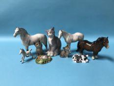 Three Beswick horses, a Bing and Grondahl seated cat, a Royal Crown Derby paperweight of a cat etc.