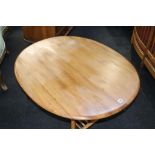 An Ercol Golden Dawn oval coffee table