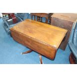 A Victorian mahogany drop leaf table