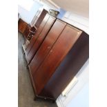 Two Stag wardrobes, double bed, nest of tables and a chest of drawers