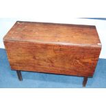 A mahogany drop leaf table