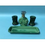 An Art Deco style Ingrid malachite glass perfume bottle, tray and a pair of candlesticks