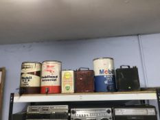 A quantity of oil cans